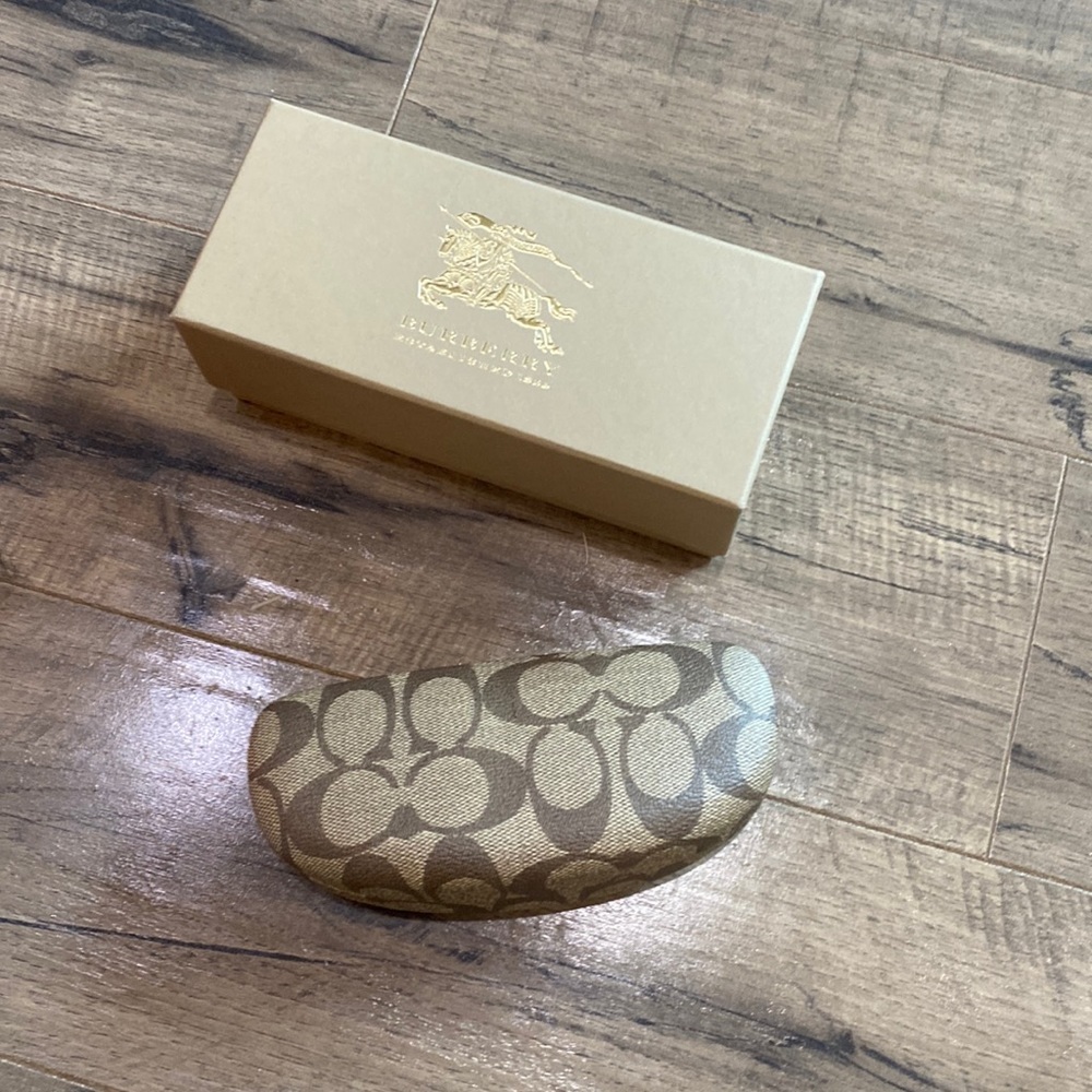 two different brands coach sunglasses case and Burberry box made of “ carton “